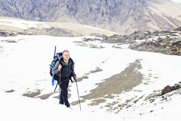 istock A man makes the approach under the mountain Elbrus. North Caucasus. Russia 1149234957