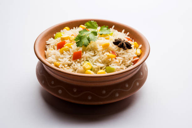 istock Corn Pilaf or Pulav made using boiled Maize seeds with rice and vegetables. selective focus 1149235070