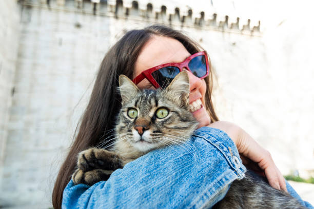 istock Woman hugging cat in Istanbul 1149235909