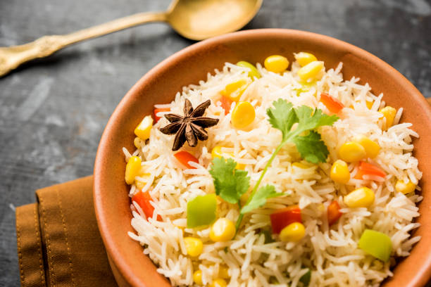 istock Corn Pilaf or Pulav made using boiled Maize seeds with rice and vegetables. selective focus 1149235919