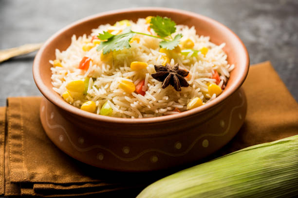 istock Corn Pilaf or Pulav made using boiled Maize seeds with rice and vegetables. selective focus 1149236020