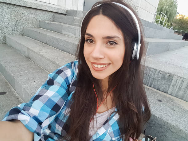 istock Urban girl making selfies downtown 1149239306