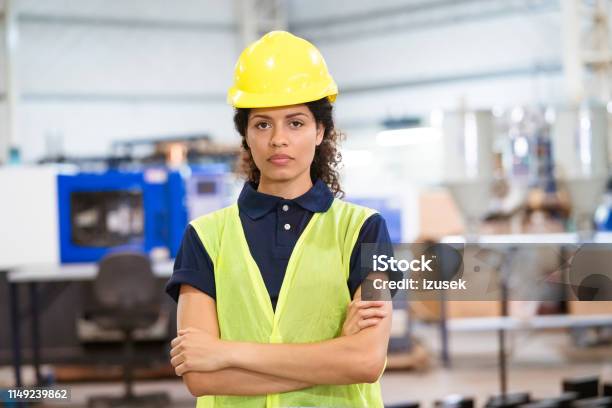 Portrait Of Engineer In Hardhat With Arms Crossed Stock Photo - Download Image Now - 30-34 Years, Adult, Adults Only