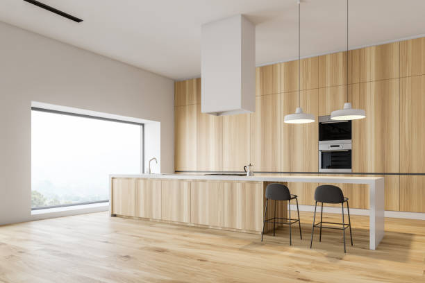istock Wooden kitchen corner with bar and ovens 1149241511