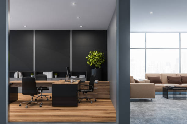 istock Gray manager office with lounge area 1149242334