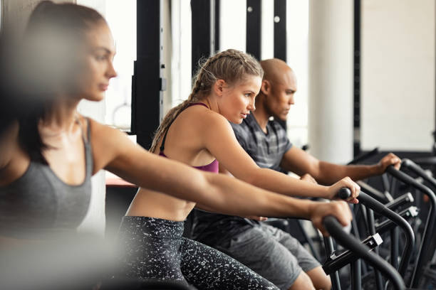 Fitness group training hardly on cycling machines