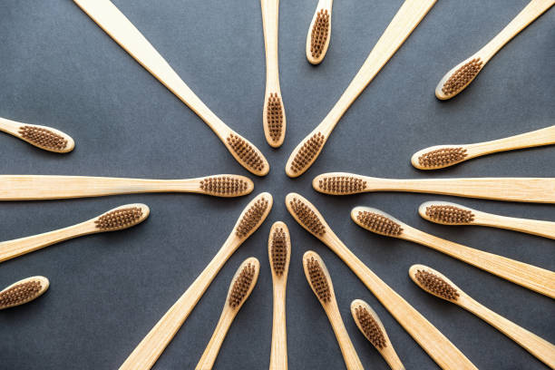 istock bamboo toothbrushes on dark rough background. plastic-free concept 1149243805