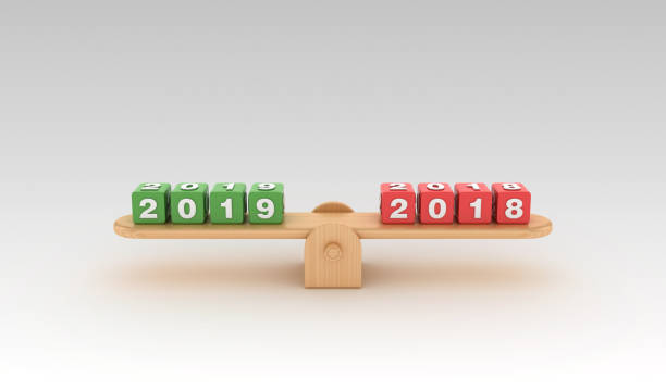 istock Seesaw with 2019 2018 Buzzword Cubes - 3D Rendering 1149243931