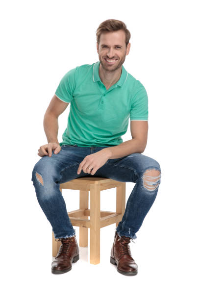istock seated happy man resting his arm on leg 1149244116