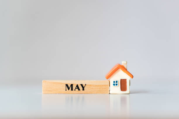 istock Miniature house with May wooden block 1149247306
