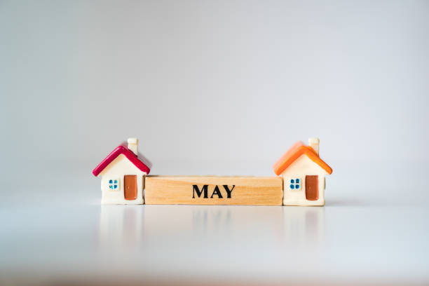 istock Miniature house with May wooden block 1149247324