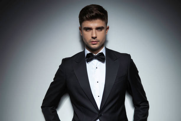 istock business young attractive guy in tuxedo standing 1149247845