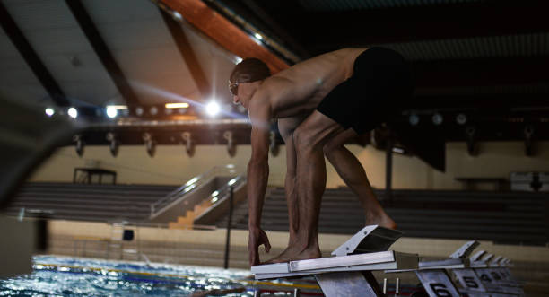 istock Swimmer On A Swimming Starting Block 1149248899