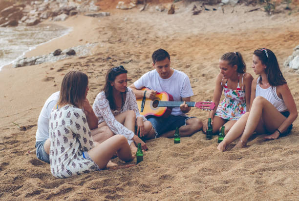 istock Friends having fun by the sea 1149249963