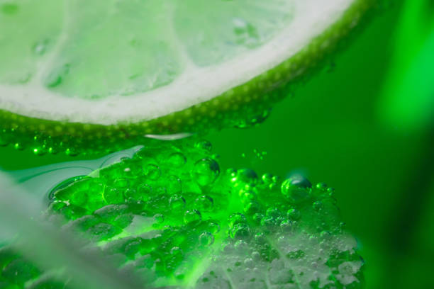 mint and lime in cocktail close-up macro in a glass
