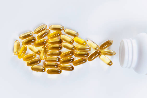 suplemento omega 3 - fish oil fotografías e imágenes de stock