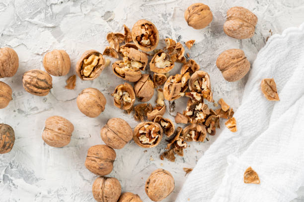 istock walnuts with a cracked or opened shell, vegetarian breakfast cookings 1149254469