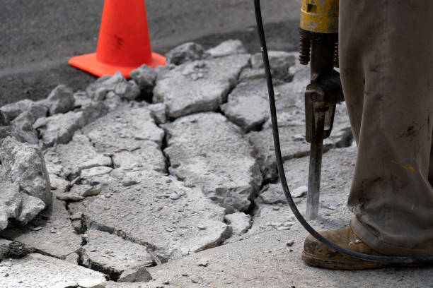 istock Man working with jackhammer on the road 1149258846