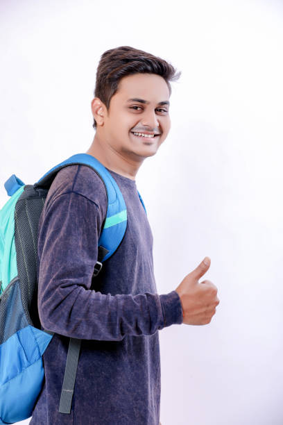 istock Indian college boy with bag 1149259475
