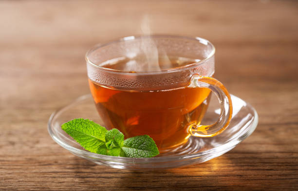 istock cup of tea with mint on wooden table 1149259717