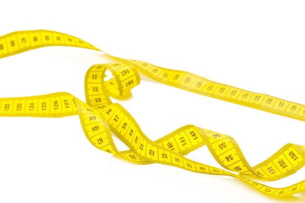 istock yellow metric measuring tape isolated on white panorama background 1149263949