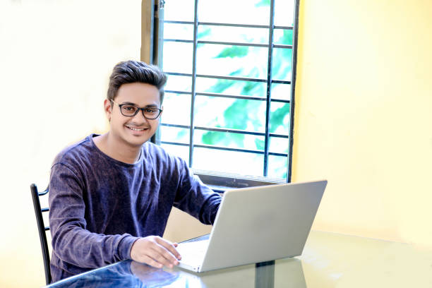 istock Young Indian Man/Student with laptop , Working on Laptop 1149264051