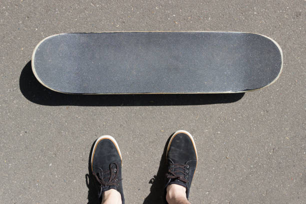 istock Skateboard and sneakers top view. lifestile concept. Copyspace.n 1149264086