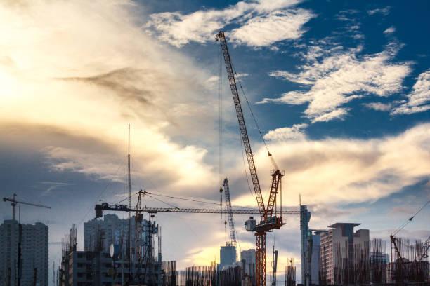 istock Tower cranes working on construction site in the city. 1149267077