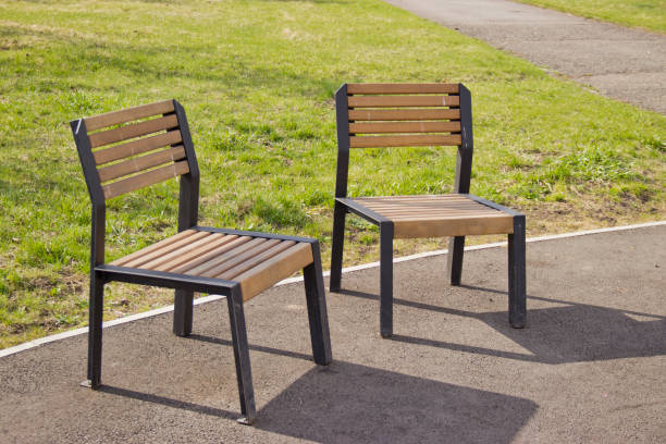 chair on the street for rest, bench for one