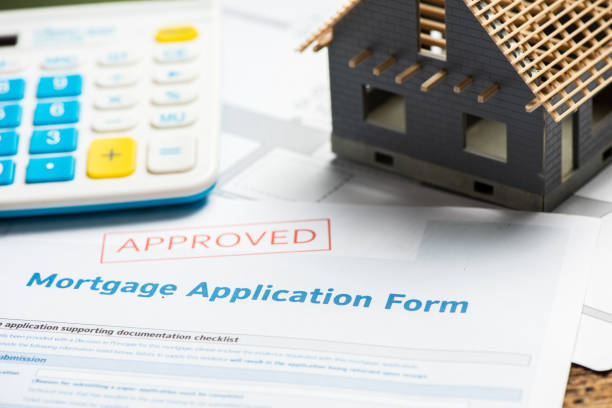 istock Approved mortgage loan agreement application. Close. 1149268981