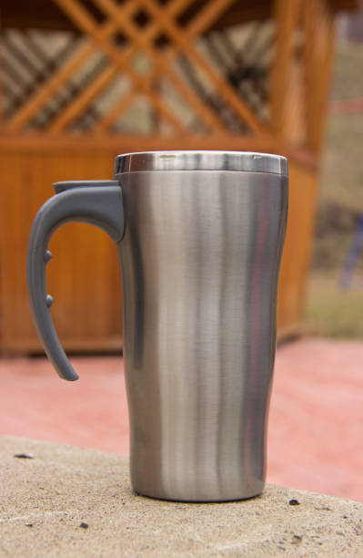istock touristic, metal mug on a natural background in sunlight 1149269040