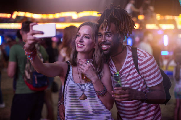 istock Couple at amusement park 1149269299