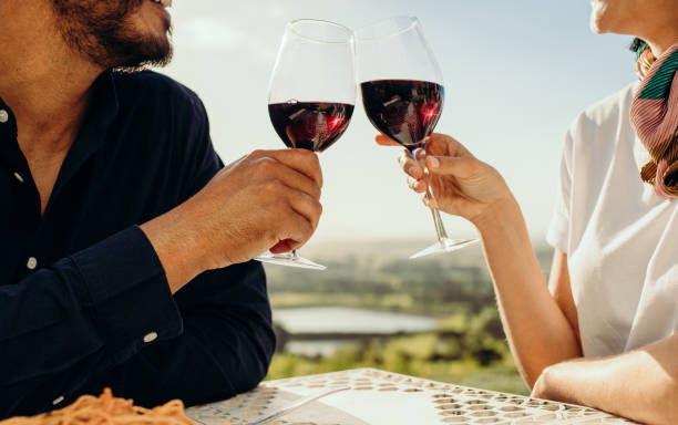 istock Close up of a couple toasting wine 1149269788