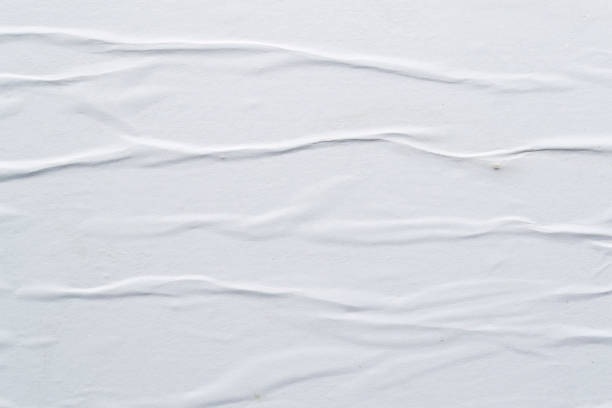 istock White creased poster texture. Abstract background. 1149270843