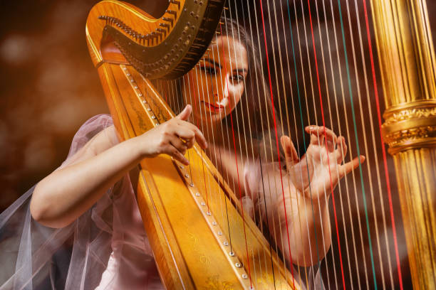 istock Professional female harpist during performance 1149271085