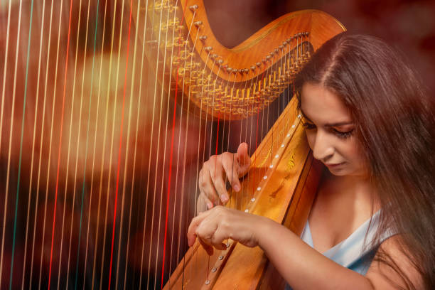 istock Professional female harpist during performance 1149271133