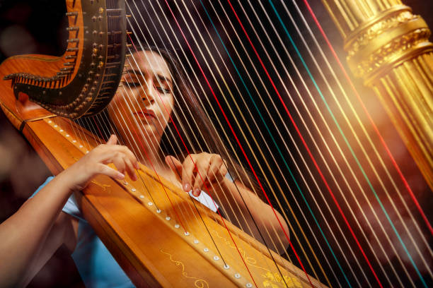 istock Professional female harpist during performance 1149271146