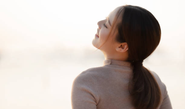 istock Asian woman she felt relaxed in the evening. 1149282305