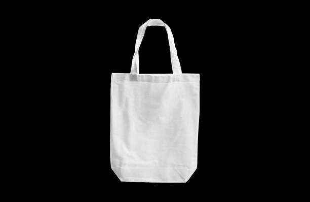 biała torba z tkaniny odizolowana na czarnym tle ze ścieżką przycinającą - shopping bag white isolated blank zdjęcia i obrazy z banku zdjęć