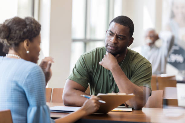 istock Mid adult Army veteran thinks about a loan 1149285436