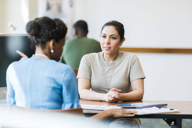 istock Hispanic soldier listens intently to account information 1149285448