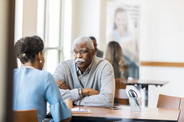 istock African American retiree discusses mortgage options 1149285471
