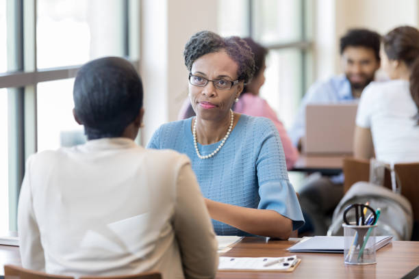 istock Banker is concerned about customer's financial situation 1149285644