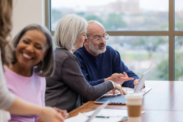 istock Caucasian husband and wife work together on homework 1149286196