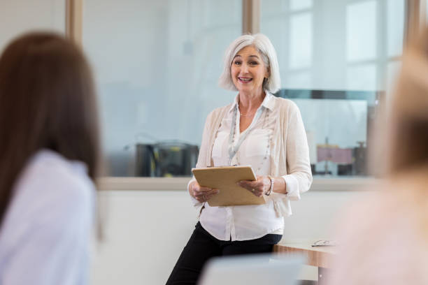 istock Confident Caucasian teacher introduces syllabus 1149286292
