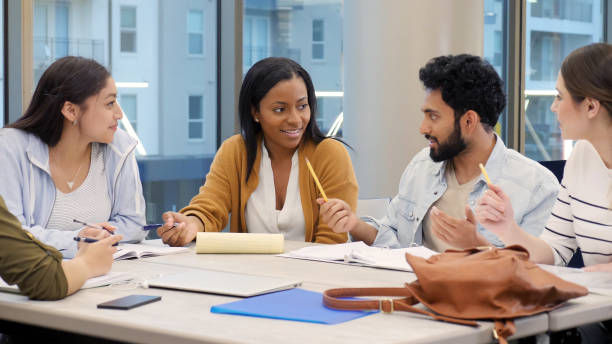 istock Mid adult female college student participates in study group 1149286335