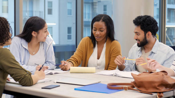 istock Group of college coeds study for exam 1149286336