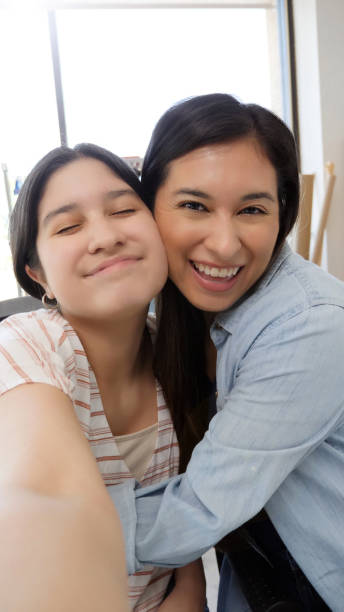 istock A mother and daughter take selfie 1149286904