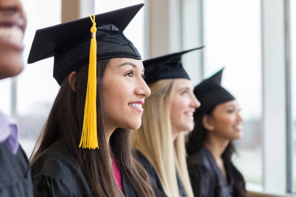 istock Attractive group of teens line up for graduation 1149286912