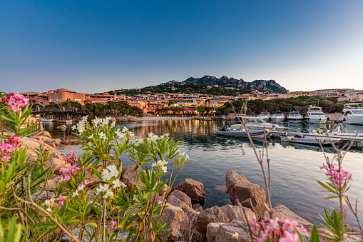 One of the most beautiful evenings of the Sardinia in the setting of Porto Cervo, between sunsets and luxury Yachts